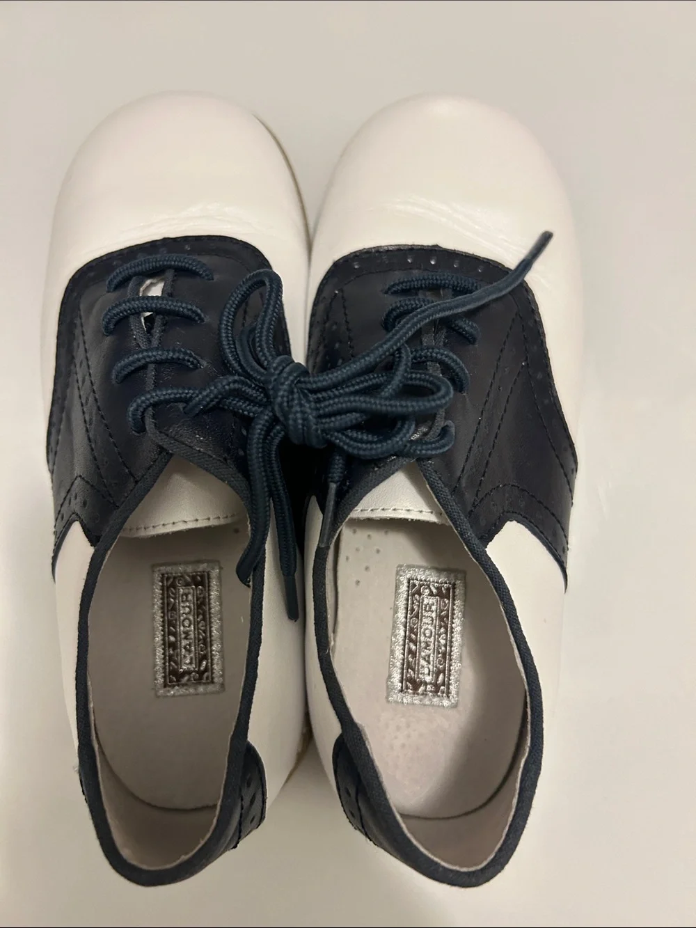 EUC Kiss Lamour navy blue and white saddle oxfords size 2